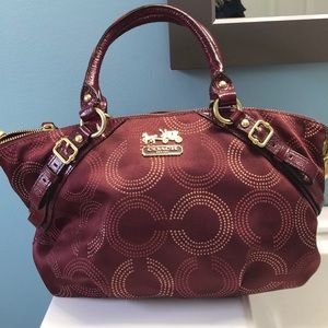 Cranberry Coach bag with gold detail